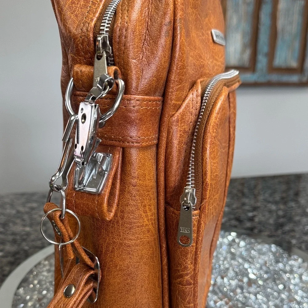 World Traveler Vintage tan Leather locking Bag